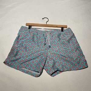 Pink donut pattern with sprinkles with a light blue fill.